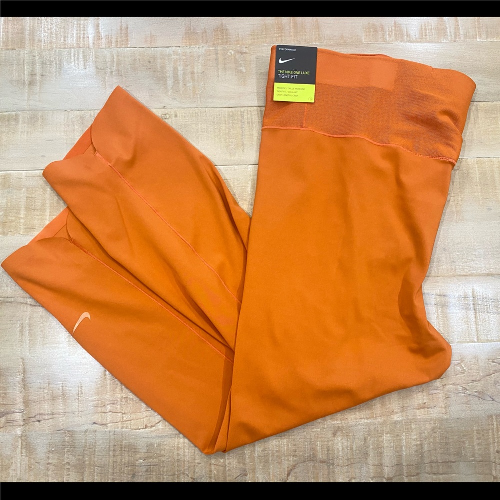 Nike One luxe Icon clash womens Mid rose crop leggings NWT 2X orange